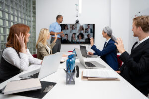 a group of people in a meeting