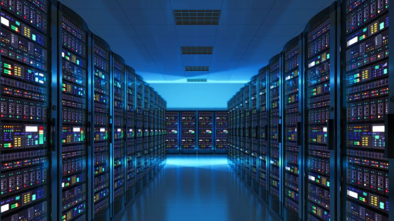 Room full with IT data machinery meant to depict end-of-life for Tungsten Automation solutions