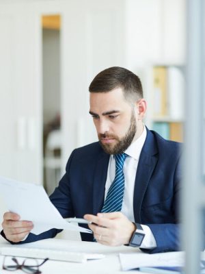 Lawyer looking at a piece of paper