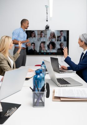 a group of people in a meeting