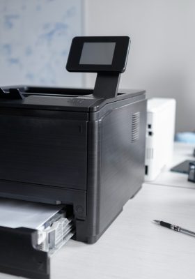 a printer on a desk in an office