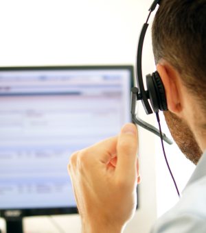 Account manager makes a support calls in a call center