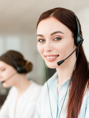 IT support operator in the company taking business calls and helping customers with their requests