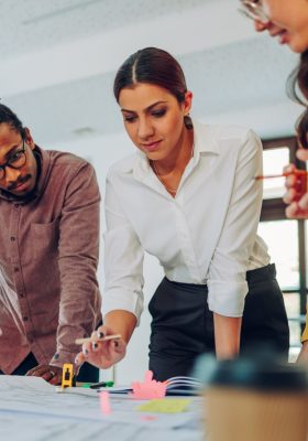 Group of engineers working together on a construction plan