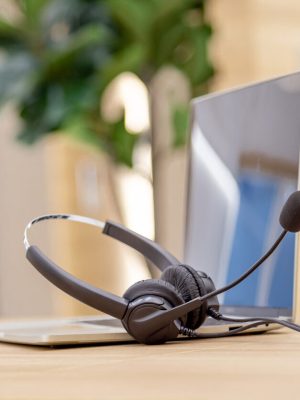 Headset and customer support equipment at call center service.