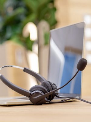 Headset and customer support equipment at call center service.