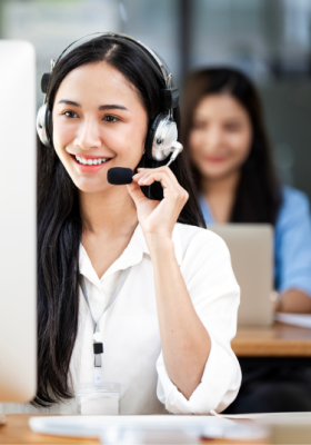 a woman wearing a headset and smiling