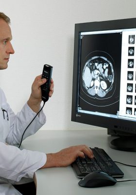 Doctor using a microphone to dictate